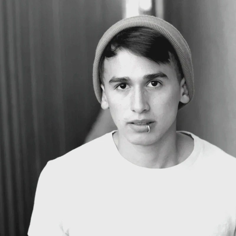 A teen looking toward the camera